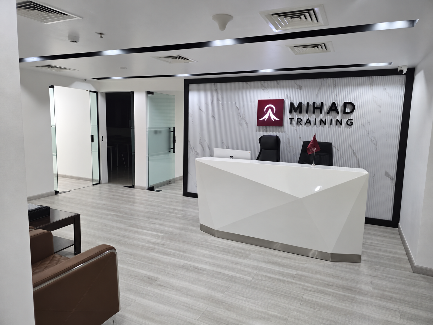 Trainer with learners at Al Mihad Training Center